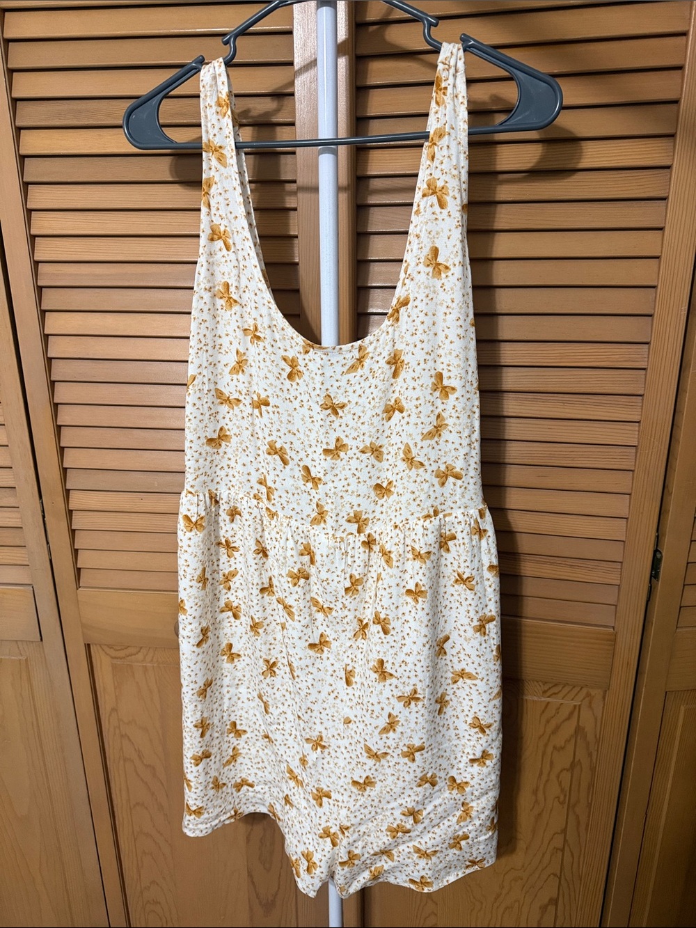 White Floral Scoop Neck Romper with Mustard Butterfly Print